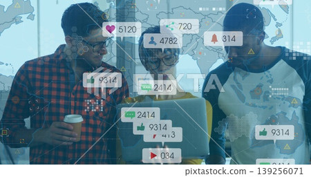 Collaborating three professionals reviewing social metrics in office, with laptop and icon overlays Collaborating three professionals reviewing social metrics in office, with laptop and icon overlays 139256071
