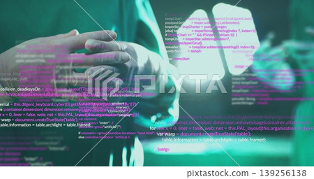 Clasping hands, surgeon in gown and gloves standing in operating room under light, code overlay Clasping hands, surgeon in gown and gloves standing in operating room under light, code overlay 139256138