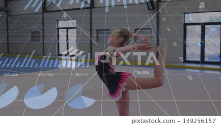 Balancing child female gymnast performing high leg hold on gym floor, with digital chart overlays Balancing child female gymnast performing high leg hold on gym floor, with digital chart overlays 139256157
