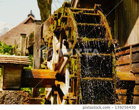 Landscape with a water wheel Landscape with a water wheel 139256430