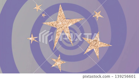 Glittering group of six gold-textured stars rotating over purple lavender spiral backdrop 139256601
