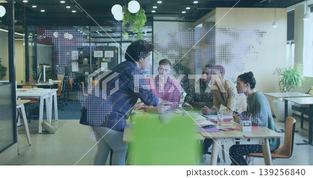 Leaning Hispanic woman presenting ideas at open-plan office table with laptop and mugs, copy space Leaning Hispanic woman presenting ideas at open-plan office table with laptop and mugs, copy space 139256840