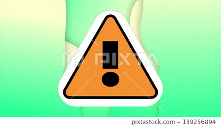 Displaying orange triangular warning sign glowing atop green gradient background, signaling caution Displaying orange triangular warning sign glowing atop green gradient background, signaling caution 139256894