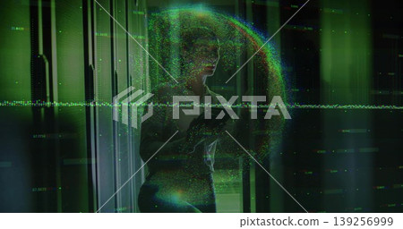 Reviewing tablet data, IT specialist in business attire in data center, server racks, code overlay Reviewing tablet data, IT specialist in business attire in data center, server racks, code overlay 139256999