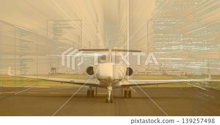 Displaying white business jet sitting on airport tarmac, runway markings, grass, code overlay Displaying white business jet sitting on airport tarmac, runway markings, grass, code overlay 139257498