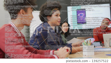 Curly-haired developer leading discussion in conference room with laptops smartphone documents code 139257522
