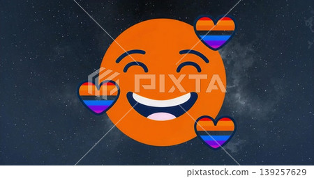 Floating large orange smiling face emoji orbiting deep star field, with four rainbow-striped hearts Floating large orange smiling face emoji orbiting deep star field, with four rainbow-striped hearts 139257629
