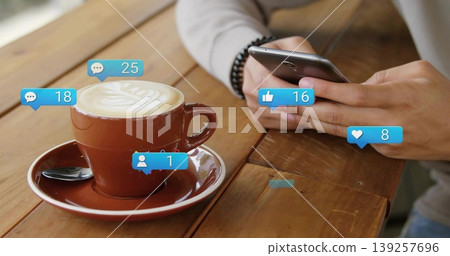 Checking man in shirt scrolling smartphone at cafe with coffee cup, notification icons, copy space Checking man in shirt scrolling smartphone at cafe with coffee cup, notification icons, copy space 139257696