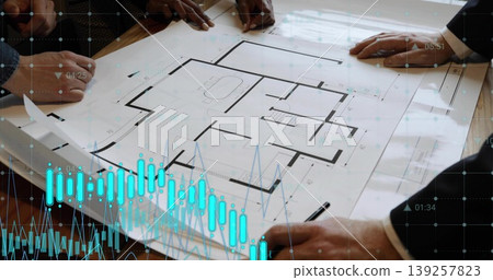 Architects annotating blueprint on wooden table in meeting room, with pen, digital overlays Architects annotating blueprint on wooden table in meeting room, with pen, digital overlays 139257823