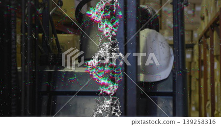 Sitting white safety helmet on rack amid boxes and hosed kettle in storage aisle, glitch overlay Sitting white safety helmet on rack amid boxes and hosed kettle in storage aisle, glitch overlay 139258316