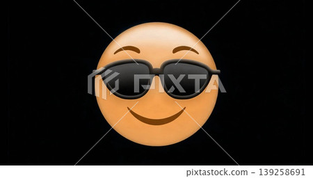 Displaying yellow emoji wearing black sunglasses on solid black background, digital rendering Displaying yellow emoji wearing black sunglasses on solid black background, digital rendering 139258691