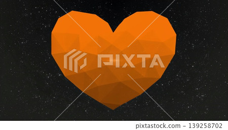 Floating faceted orange heart shape rotating in deep space, with countless tiny white stars 139258702