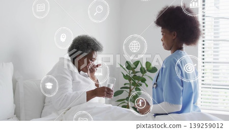Patient in bathrobe drinking water from glass in care room, with nurse in scrubs stethoscope plant Patient in bathrobe drinking water from glass in care room, with nurse in scrubs stethoscope plant 139259012
