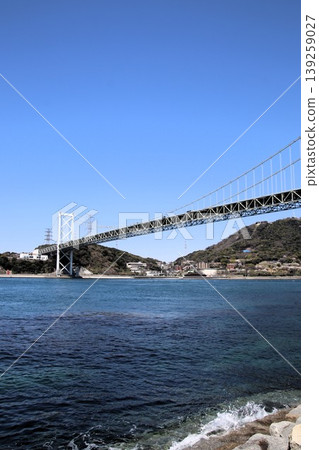 The Kanmon Strait and Kanmon Bridge as seen from No-Hawk Square in Mojiko. 139259027