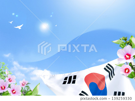 A flag of South Korea waves gently in the air. Colorful flowers surround the flag as birds fly overhead. The sky is bright with a shining sun, indicating a clear day. A flag of South Korea waves gently in the air. Colorful flowers surround the flag as birds fly overhead. The sky is bright with a shining sun, indicating a clear day. 139259330