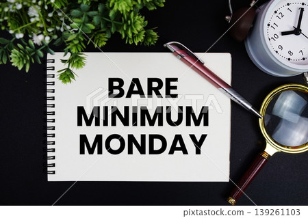 Bare Minimum Monday text with alarm clock and magnifying glass Bare Minimum Monday text with alarm clock and magnifying glass 139261103