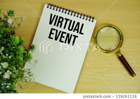 Virtual Event text written on notepad with magnifying glass flat lay on wooden background Virtual Event text written on notepad with magnifying glass flat lay on wooden background 139261138