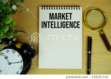 Market Intelligence text written on notepad with alarm clock and magnifying glass flat lay on wooden background Market Intelligence text written on notepad with alarm clock and magnifying glass flat lay on wooden background 139261142