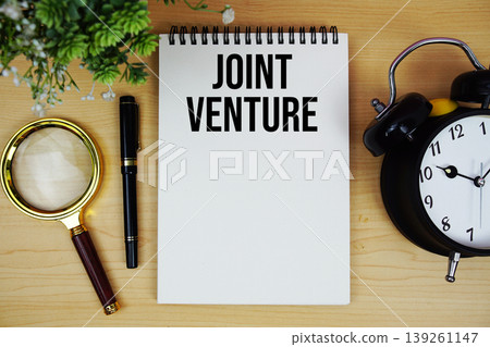 Your Daily Routine Matters text written on notepad with alarm clock and magnifying glass flat lay on wooden background 139261147