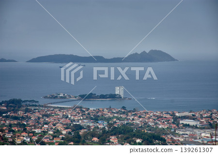 Elevated perspective of Ria de Vigo showcasing its mouth and iconic islands Elevated perspective of Ria de Vigo showcasing its mouth and iconic islands 139261307