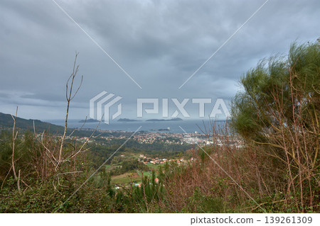 Elevated perspective of Ria de Vigo showcasing its mouth and iconic islands Elevated perspective of Ria de Vigo showcasing its mouth and iconic islands 139261309