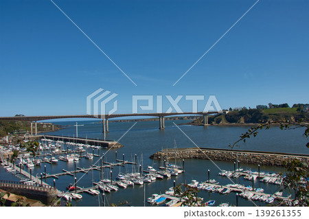 A panoramic view of the Ponte dos Santos bridge connecting Galicia and Asturias from Ribadeo, Spain. A panoramic view of the Ponte dos Santos bridge connecting Galicia and Asturias from Ribadeo, Spain. 139261355