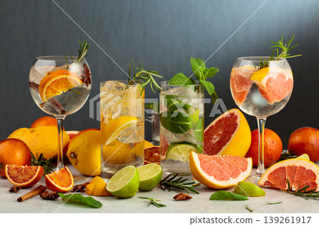 Refreshing summer drinks with ingredients on a white marble table. Refreshing summer drinks with ingredients on a white marble table. 139261917