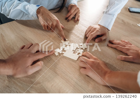 Top view of office workers that are playing puzzle game, conception of success 139262240