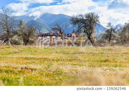 buildings in bansko, snowy pirin peaks in bulgaria buildings in bansko, snowy pirin peaks in bulgaria 139262546
