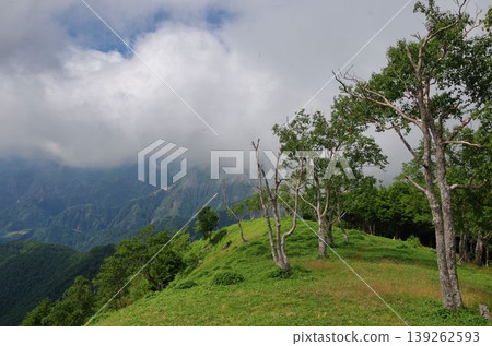 Views from the summit of Mt. Shazan and mountains shrouded in clouds. Views from the summit of Mt. Shazan and mountains shrouded in clouds. 139262593