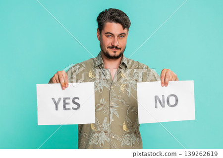 Man holding yes and no signs offering choice decision-making opportunity question propose selection 139262619