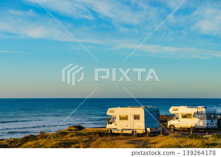 Camper rv camping on sea shore, Spain Camper rv camping on sea shore, Spain 139264178