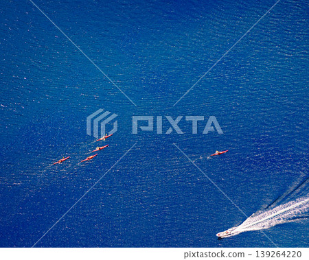 fjord in Norway and people kayaking fjord in Norway and people kayaking 139264220
