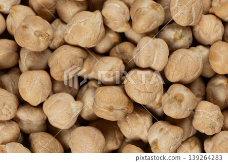 Macro texture of organic raw chickpea seeds. 139264283