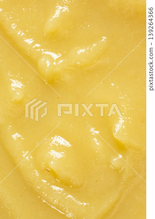Detailed texture of natural apple sauce for food background. Detailed texture of natural apple sauce for food background. 139264366