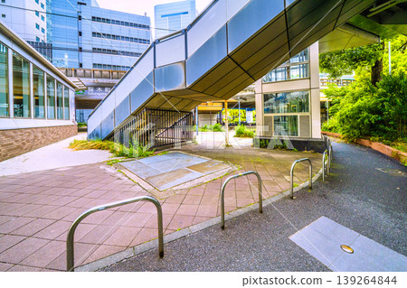 A view of the urban landscape of Yokohama, Japan, including the "Original Landmark of the Birthplace of Railways" (bottom right of the screen) located in front of the new south exit (city hall exit) of Sakuragicho Station. A view of the urban landscape of Yokohama, Japan, including the "Original Landmark of the Birthplace of Railways" (bottom right of the screen) located in front of the new south exit (city hall exit) of Sakuragicho Station. 139264844