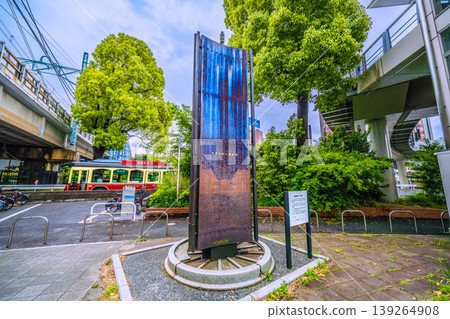 Yokohama cityscape, Japan: In front of the new south exit (city hall exit) of Sakuragicho Station. View of the "Birthplace of the Railway Monument" and the Akai Kutsu (Red Shoes) landmark. Yokohama cityscape, Japan: In front of the new south exit (city hall exit) of Sakuragicho Station. View of the "Birthplace of the Railway Monument" and the Akai Kutsu (Red Shoes) landmark. 139264908