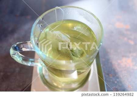 Tea in a glass cup with a tea bag Tea in a glass cup with a tea bag 139264982