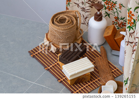 Assortment of Soaps and Dispensers bottles. Natural eco set of shower gels and lotions and a washcloth. Soap bar tar Assortment of Soaps and Dispensers bottles. Natural eco set of shower gels and lotions and a washcloth. Soap bar tar 139265155
