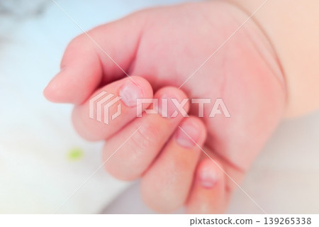 Close up of a baby's tiny hand 139265338