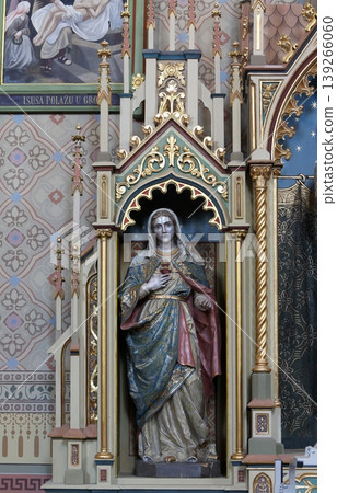 Immaculate heart of Mary statue on the Sacred heart of Jesus altar in the church of Saint Matthew in Stitar, Croatia. Immaculate heart of Mary statue on the Sacred heart of Jesus altar in the church of Saint Matthew in Stitar, Croatia. 139266060