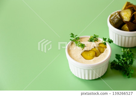 creamy tartar sauce with sliced gherkins and fresh herbs creamy tartar sauce with sliced gherkins and fresh herbs 139266527