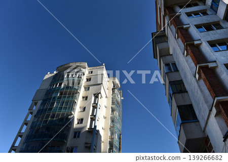 Perspective view of flat of blocks from Communist period, worn out concrete buildings in Eastern Europe Perspective view of flat of blocks from Communist period, worn out concrete buildings in Eastern Europe 139266682