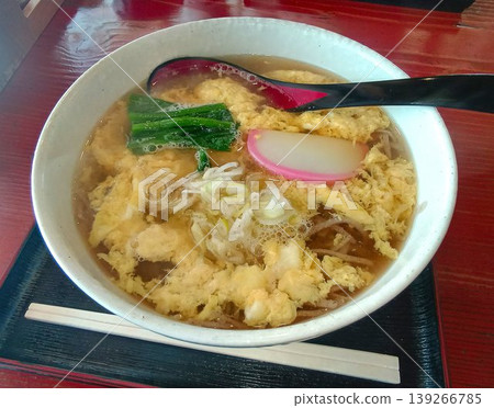 Enjoying the flavor of the broth with the egg... 'Egg Drop Soba' from a Japanese soba restaurant. Enjoying the flavor of the broth with the egg... 'Egg Drop Soba' from a Japanese soba restaurant. 139266785