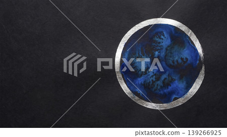 A platinum circle and electric blue watercolor float on the right side of the black Japanese paper. A platinum circle and electric blue watercolor float on the right side of the black Japanese paper. 139266925
