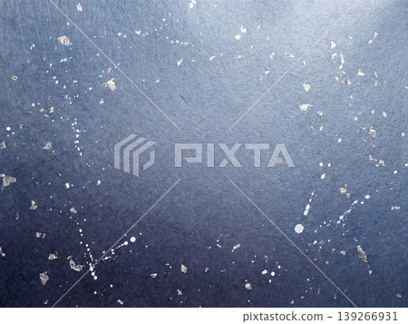 A gradient from steel blue to indigo and a shimmering silver foil background on washi paper. A gradient from steel blue to indigo and a shimmering silver foil background on washi paper. 139266931