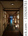 The long corridor of the charming Japanese-style inn where I stayed during a winter hot spring trip. 139268783