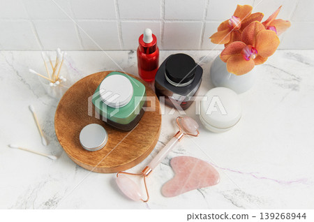 Skincare products, facial roller, gua sha beauty routine 139268944