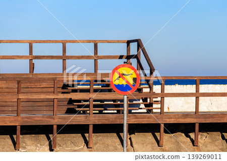 No Diving sign near the wooden pier No Diving sign near the wooden pier 139269011