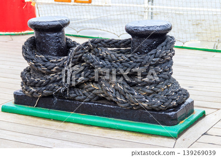 Nautical ropes on a deck of a large ship Nautical ropes on a deck of a large ship 139269039